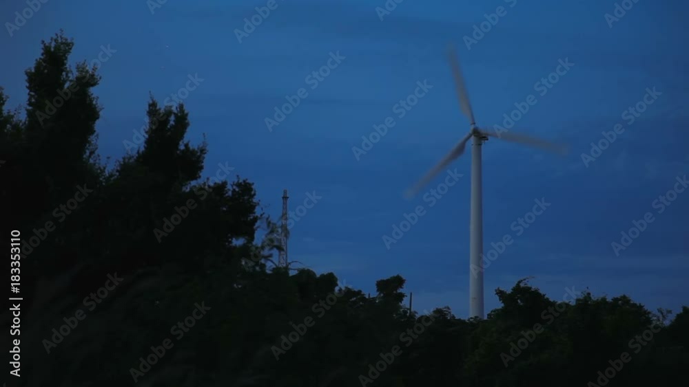 Working wind engine. Dusk at Windmill viewpoint. Phuket island, Thailand. Working wind engine. Dusk at Windmill viewpoint. Phuket island, Thailand.