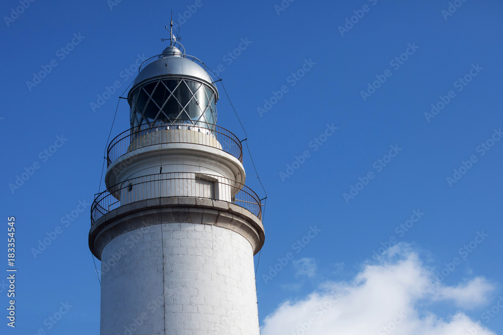 lighthouse on a background of blue sky