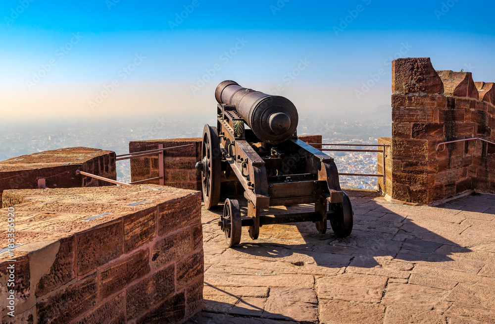 Old historical cannon on the fortress wall of Mehrangarh Fort in Jodhpur, Rajasthan, India
