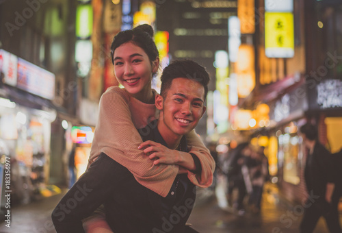 Young japanese couple spending time together in Tokyo