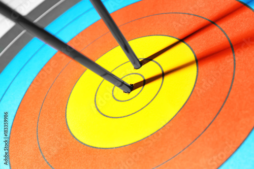 Arrows in the center of target for archery, closeup