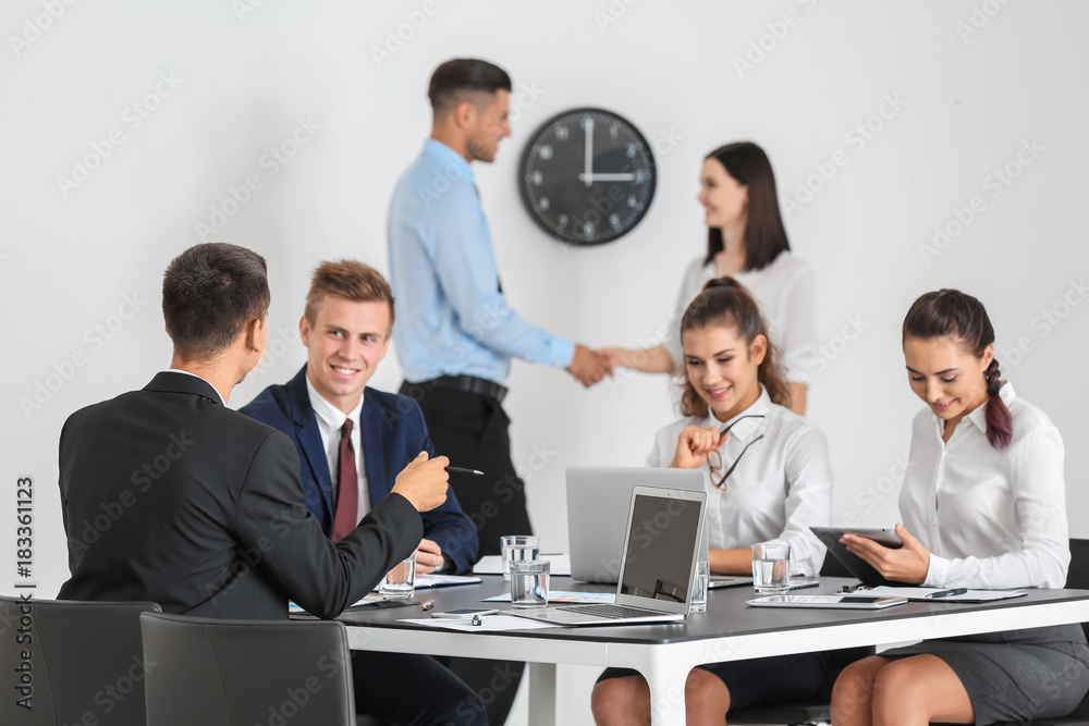 Team of young consulting experts on business meeting in office Team of young consulting experts on business meeting in office
