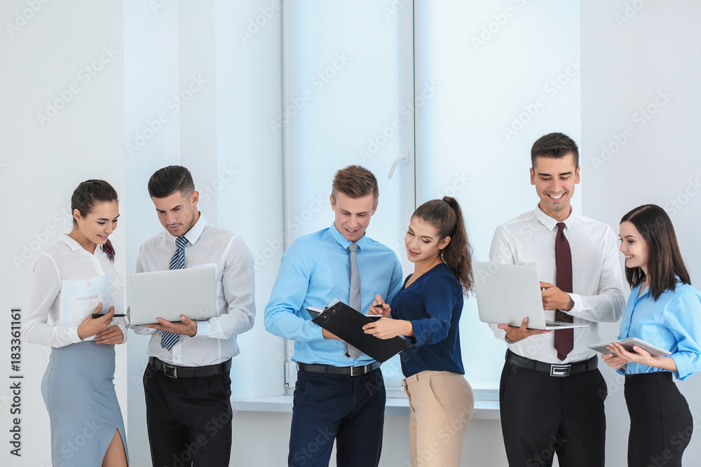 Team of young consulting experts on business meeting in office Team of young consulting experts on business meeting in office
