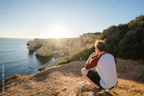Watching the sunset from a cliff in Portugal