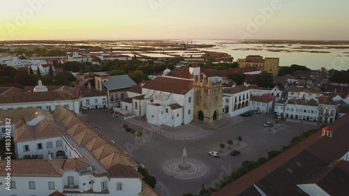 Aerial view of Faro with historic cathedral in the middle of old town, Portugal