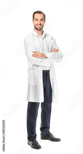 Young pharmacist on white b...
