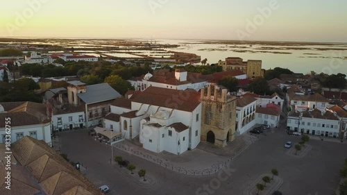 Aerial view of Faro with historic cathedral in the middle of old town, Portugal