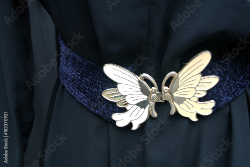 vintage fabric belt with butterfly-shaped metal buckle