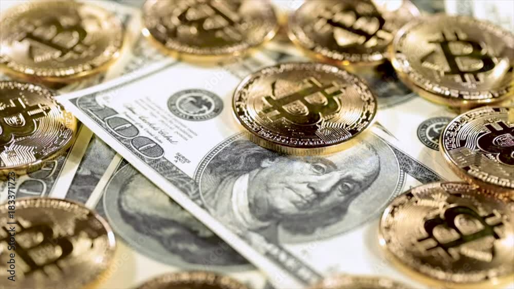 Gold Bit Coin BTC coins and dollar bills. Gold Bit Coin BTC coins and dollar bills.