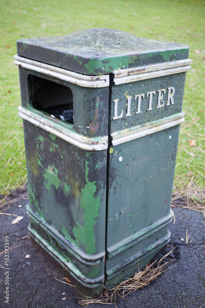 Old litter bin close up shot. Garbage concept Old litter bin close up shot. Garbage concept