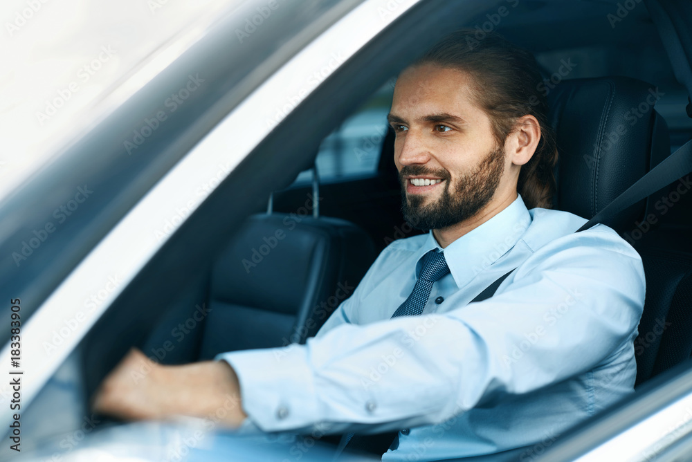 Man Driving Car. Portrait Of Smiling Male Driving Car