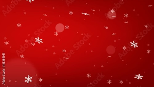 Beautiful red loopable abstract winter snow background with falling snowflakes and floating blurry glitter particles lights. 4K seamless loop video footage of the snowfall.
