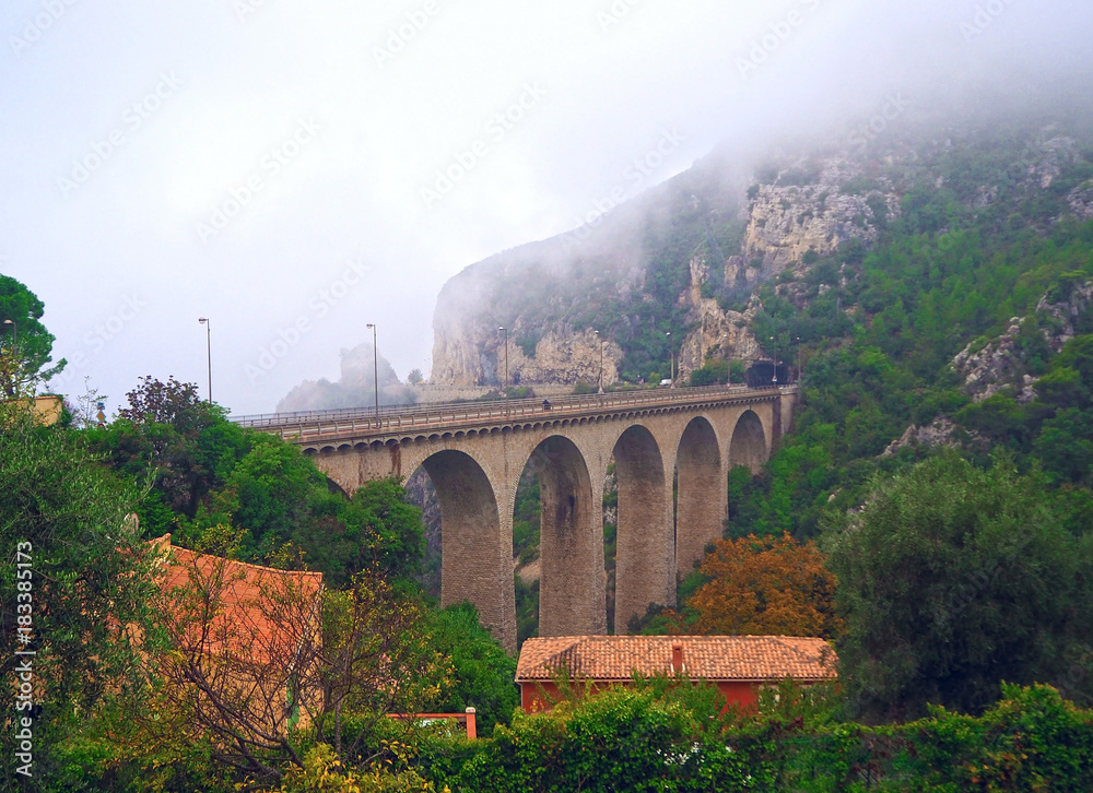 Obraz premium Stone Arch bridge (viaduct) near Eze village, French Riviera, Cote d'Azur, France.