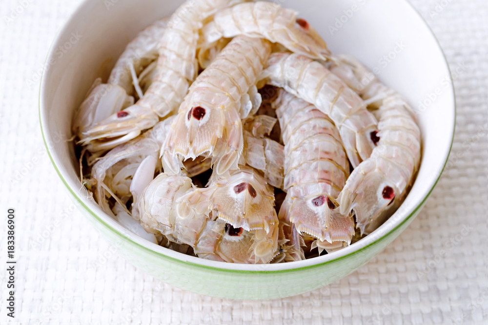 Sea cicadas, before cooking, on the plate Sea cicadas, before cooking, on the plate