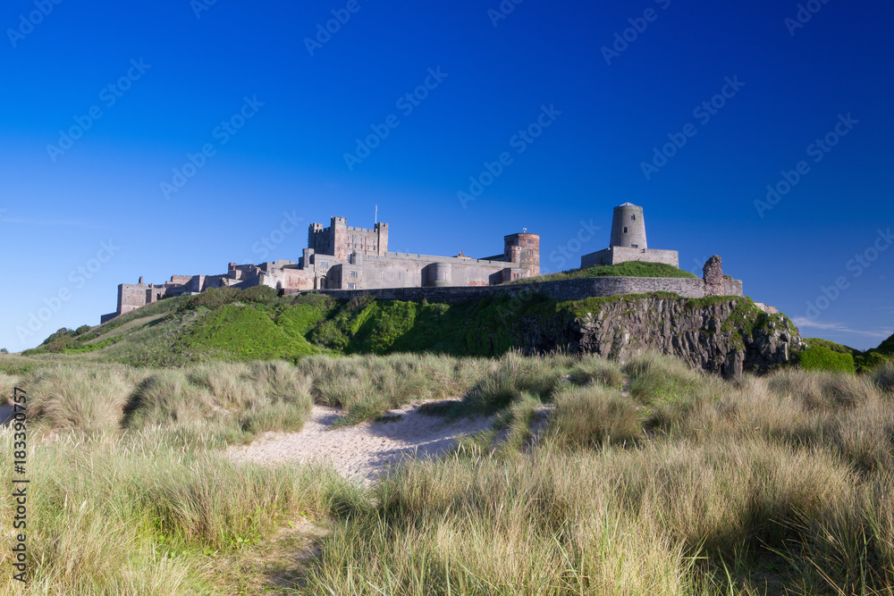 A view from beach on Bamburgh Castle, England.