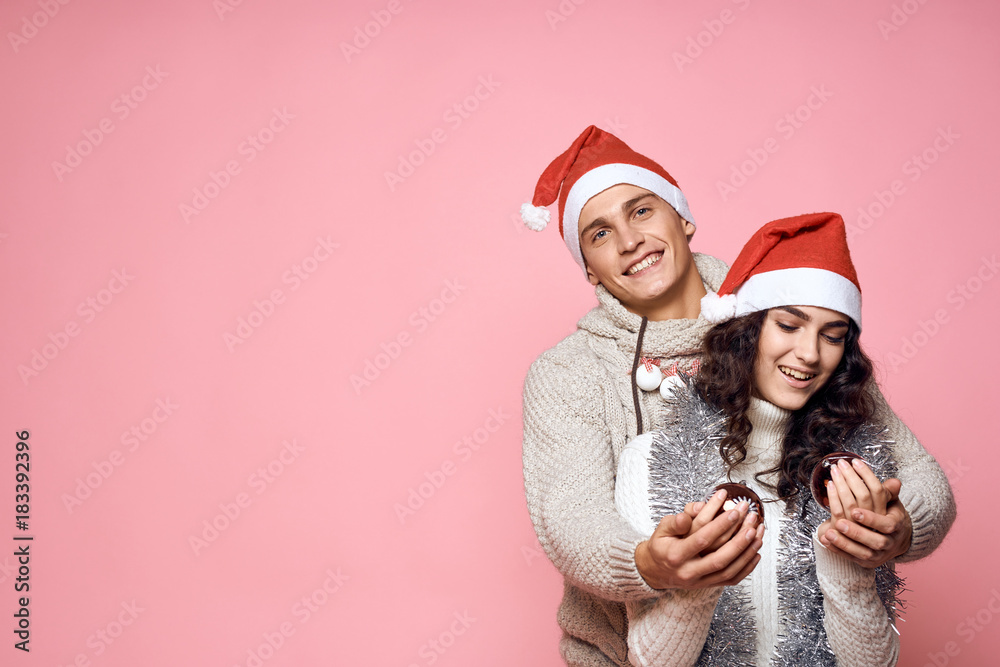couple on a light pink background, free space for copying, new year couple on a light pink background, free space for copying, new year