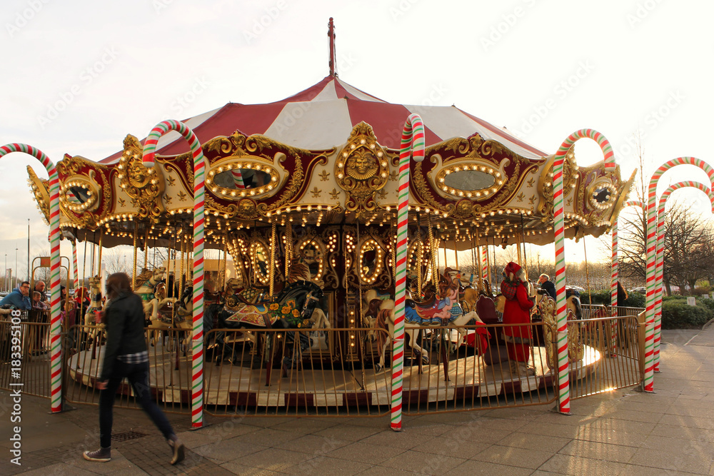 Carousel horse, Bristol, England - December 20, 2014: Winter wonderland at The Mall Cribbs Causeway shopping center.