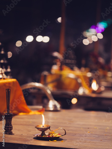 VARANASI, INDIA- 23 JANUARY 2017 : A Hindu priest performs the Ganga Aarti ritual in Varanasi photo