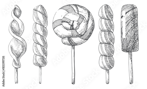 Hand drawn set of different lollipops. Vector illustration of a sketch style.