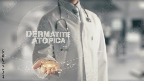 Doctor holding in hand Dermatite atopica, in English Atopic Dermatitis photo