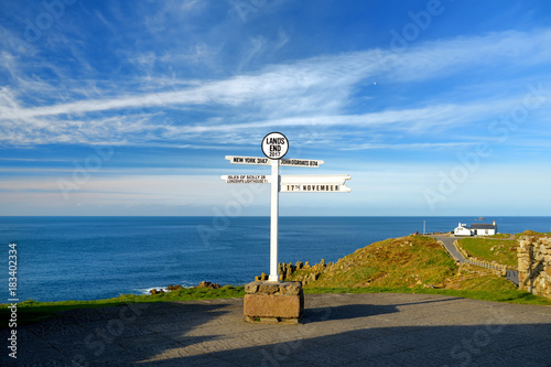 Distance signpost at Land's End, Penwith Peninsula, Cornwall, most westerly point of England. photo