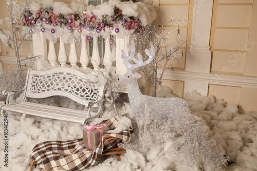 Obraz na plátne white new year decoration with plaid sleight and bench