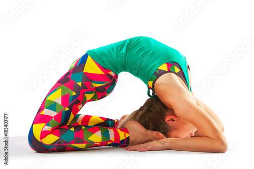 beautiful flexible woman doing yoga poses on white photo