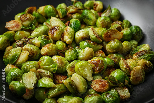 Frying pan with roasted brussel sprouts, closeup