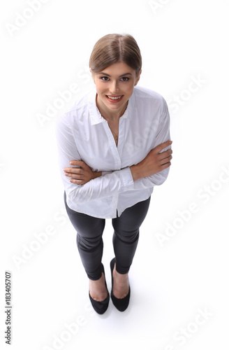 Foto view from the top..in full growth. confident young business lady.
