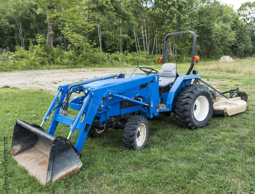 Blue tractor lwan mower
