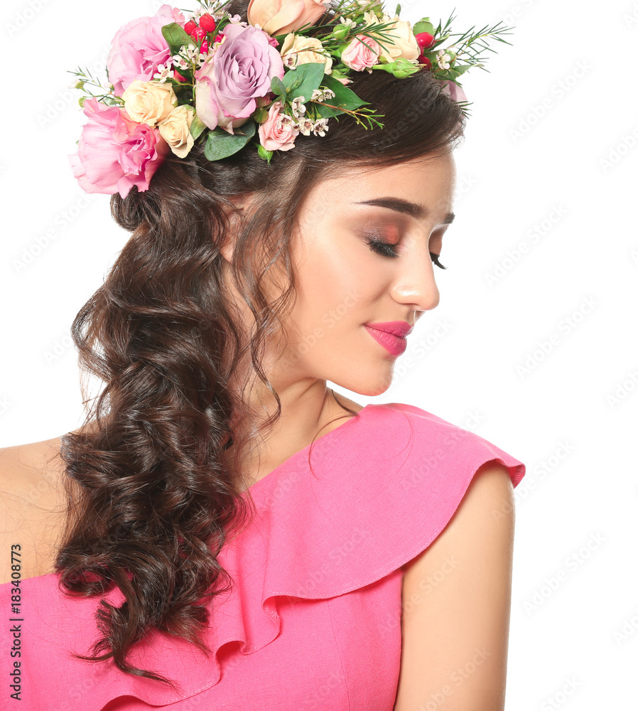 Beautiful young woman with flower wreath on white background Beautiful young woman with flower wreath on white background
