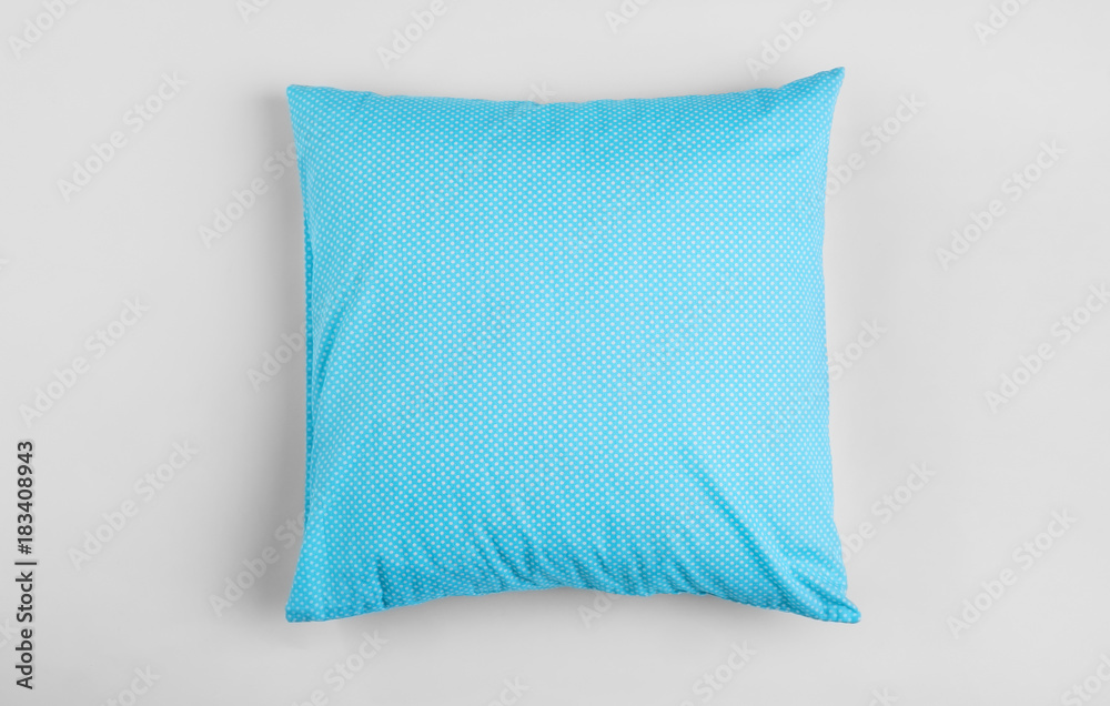 Soft pillow on light background