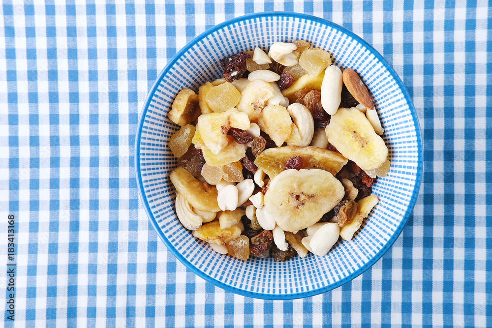 Healthy vegetarian cereal breakfast. Nuts, raisin, fruit and dry fruit pieces. Healthy vegetarian cereal breakfast. Nuts, raisin, fruit and dry fruit pieces.