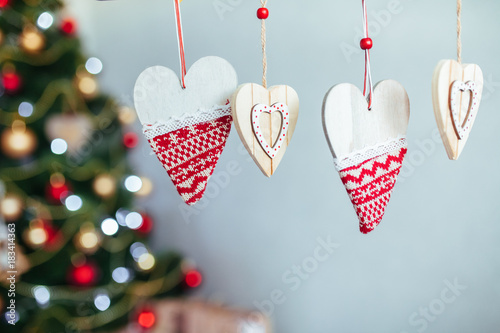 heart and spruce. Wooden background. Christmas of the heart. Black background photo