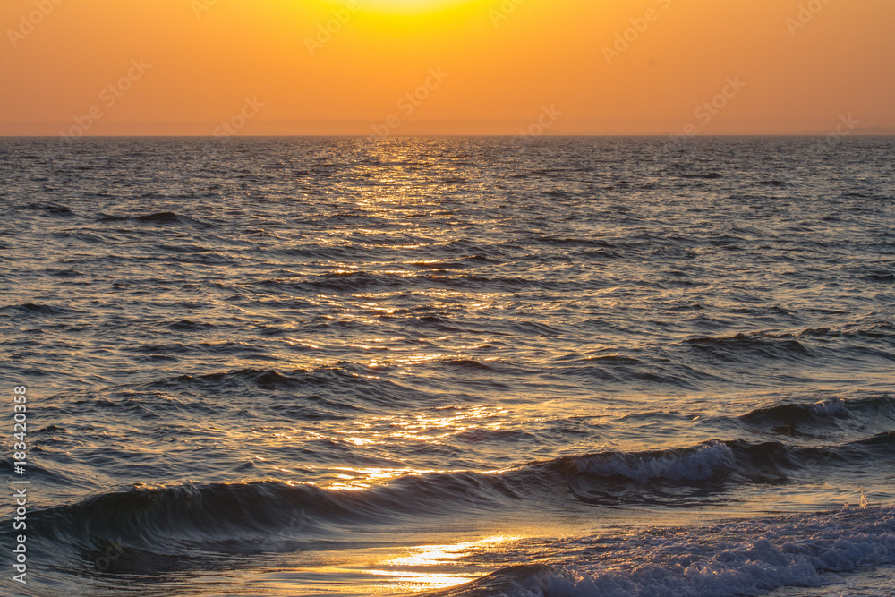 Sunset in ocean beach. sunset in sea
