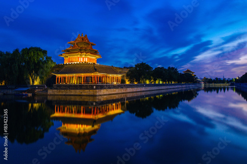 Beijing, China - JUN 27, 2014: Sunset at Forbidden City Moat, Corner Towers