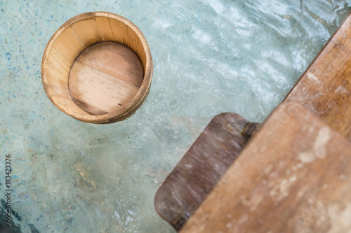 hot springs with wooden barrel scoop © PR Image Factory