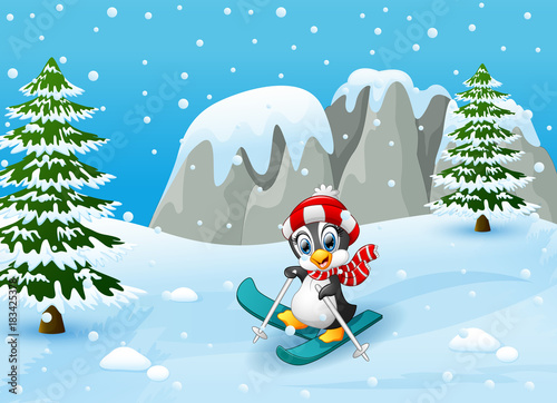 Cute penguin skiing on winter