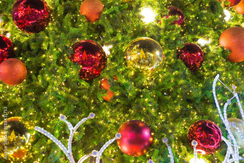 Christmas decoration with baubles balls, trees, led light background.