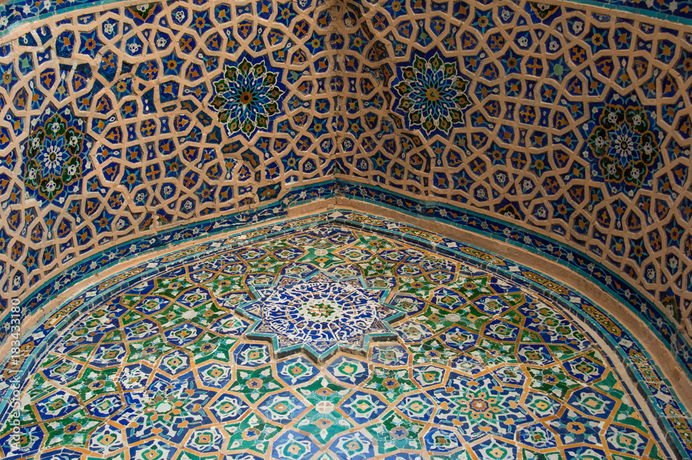 Ceiling arch with traditional ancient Asian mosaic. the details of the architecture of medieval Central Asia