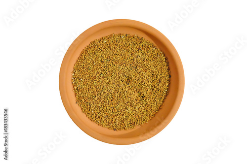 dried fenugreek seeds. isolated on white