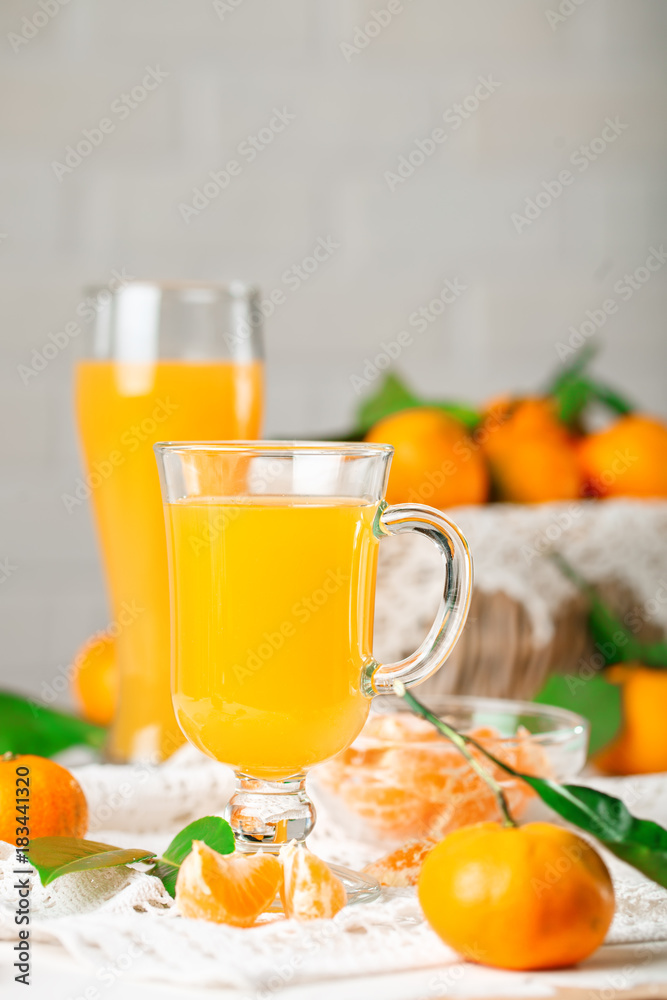 Fresh tangerines and tangerine juice. Healthy food, Selective focus. Fresh tangerines and tangerine juice. Healthy food, Selective focus.