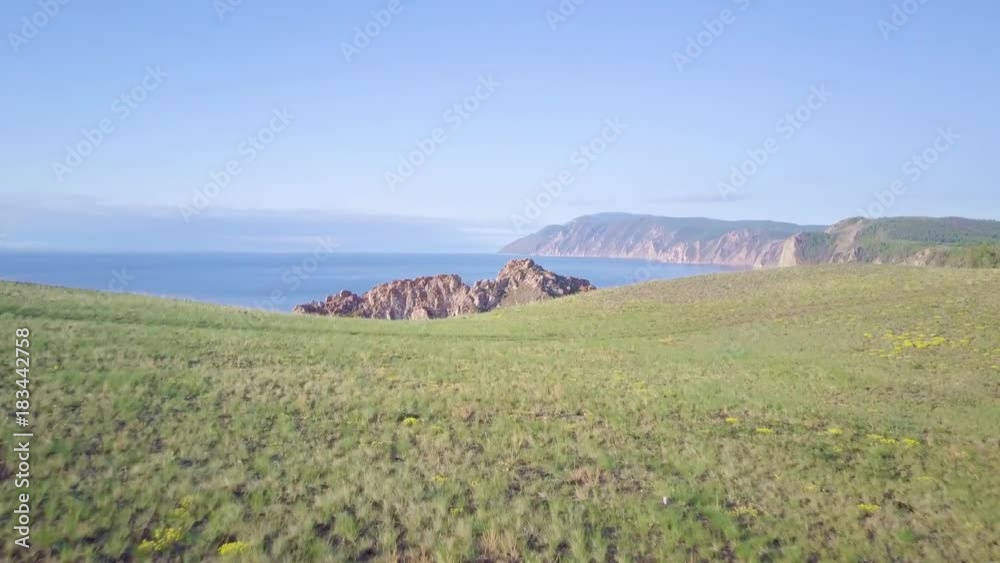 ProRes. Baikal lake shore and rocks from aerial view. Landscape. ProRes. Baikal lake shore and rocks from aerial view. Landscape.