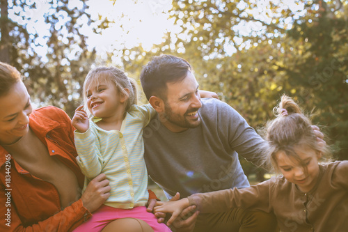 Family spending time together at nature have fun.