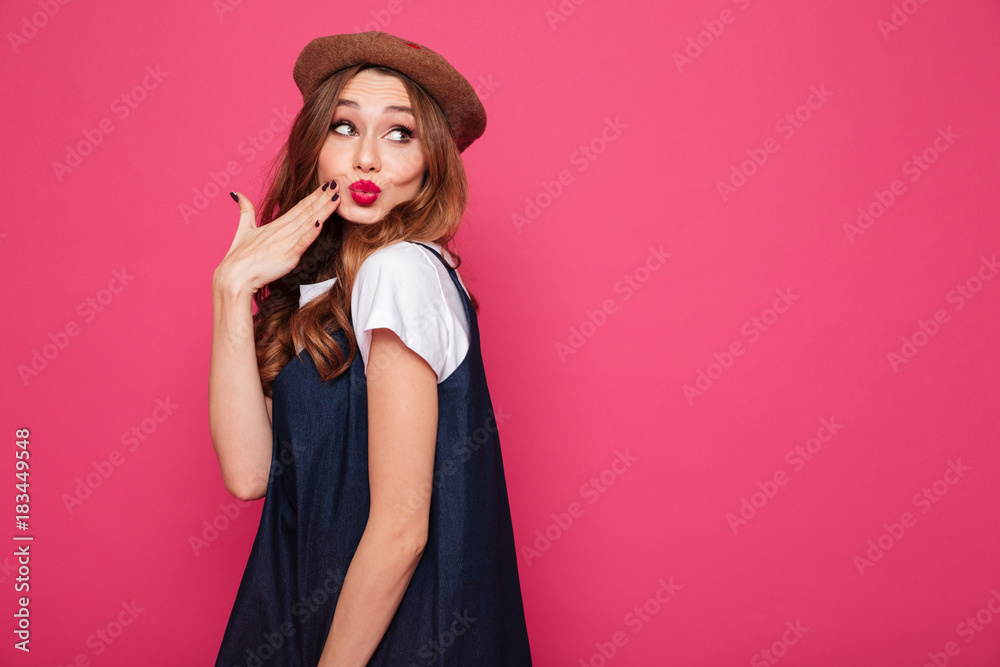 Pretty shy lady looking aside and making kiss Pretty shy lady looking aside and making kiss