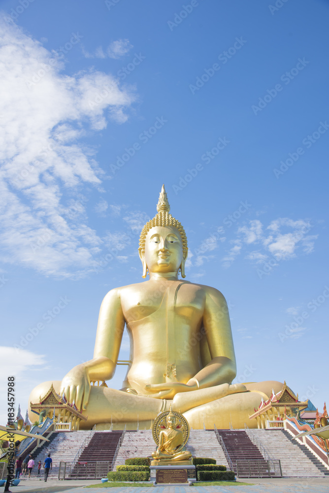 Golden Buddha statue at Wat Muang temple in Angthong, Thailand Golden Buddha statue at Wat Muang temple in Angthong, Thailand