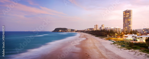 Dusk over North Burleigh Heads on the Gold Coast with the Burleigh headland visible in the distance. Gold Coast, Queensland, Australia.