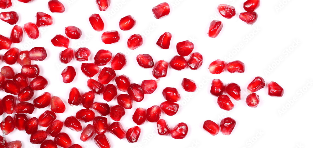 Pomegranate seeds isolated on white background, top view Pomegranate seeds isolated on white background, top view