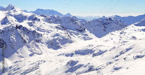 High mountains under snow in the winter. Slope on the skiing resort, European Alps © Elena Sistaliuk
