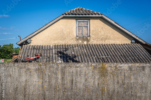 House with asbestos roof in Ukraine photo